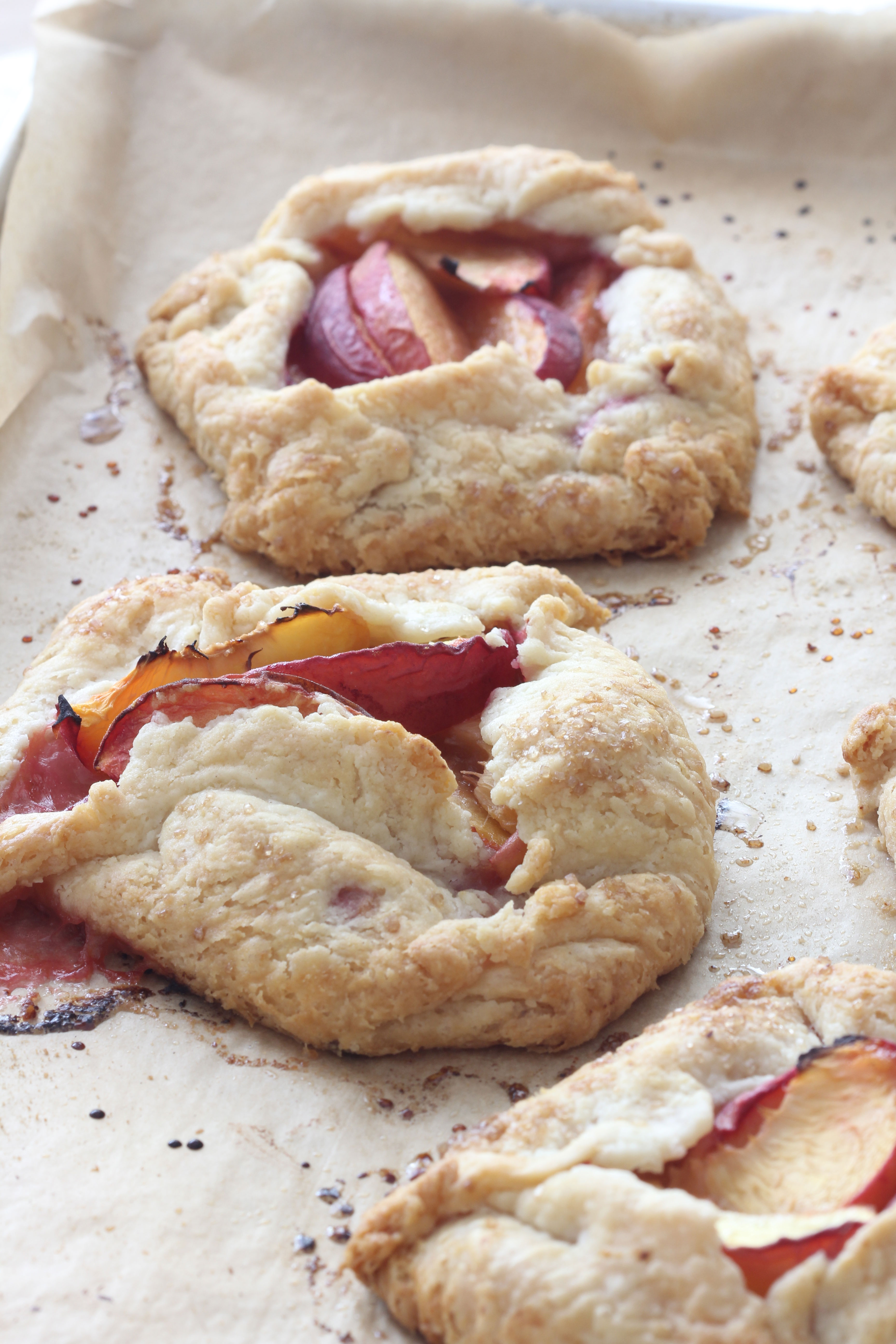 These no fuss peach hand pies are made with the lightest flakiest dough and pinched together to hold the freshest lemon tossed peaches. Melt in your mouth!