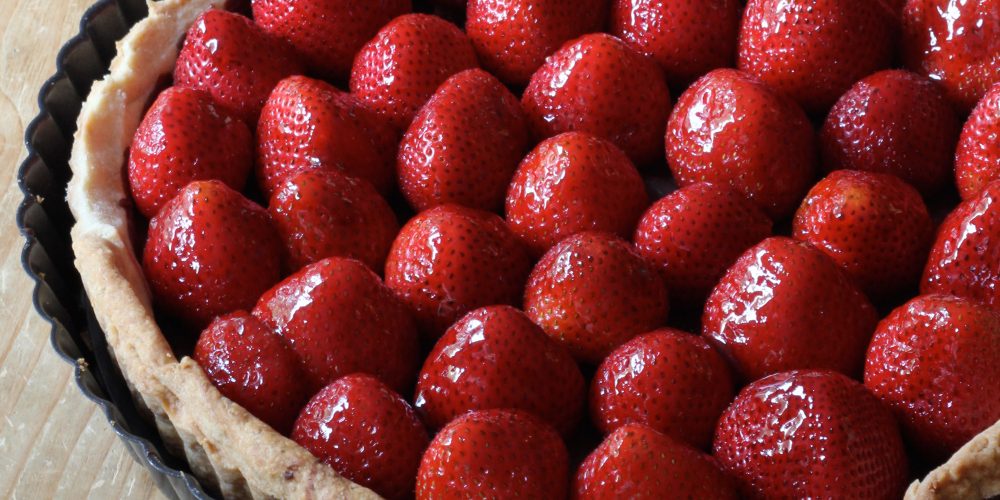 Fresh Strawberries, a light Pâte Sucrée dough with a hint of chocolate and you have a super Summer dessert! Make this Strawberry Tart and WOW your guests!
