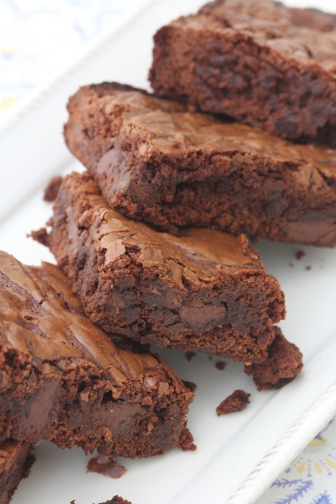 Scared to make brownies without a box? Then you need to try this recipe! It is the only way to make delicious brownies from scratch.