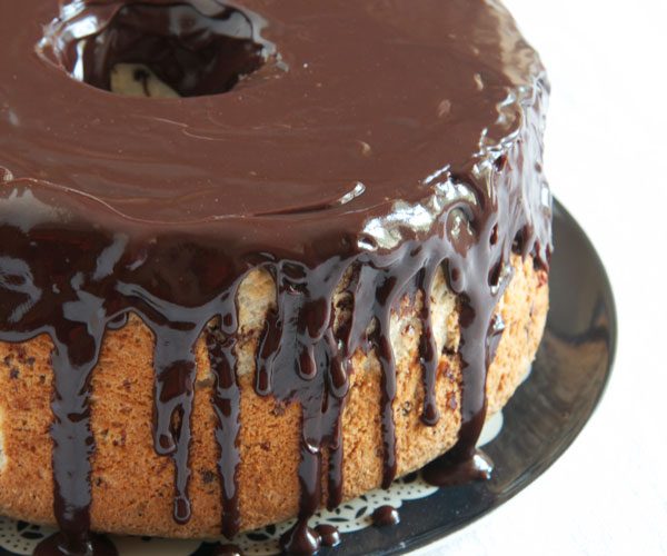 More Chocolate makes this Angel Food Cake even better! Floating Chocolate bits and teh glaze are in every scrumptious bite!