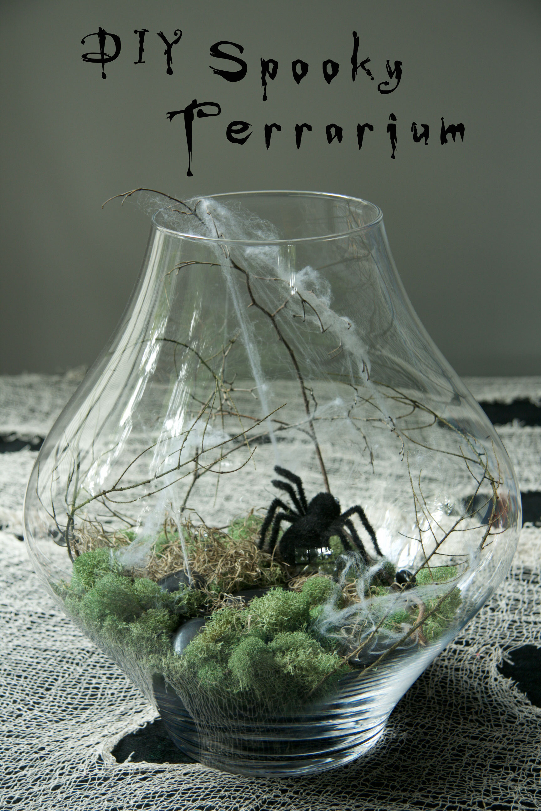 Create this easy to assemble DIY spooky terrarium with your kids or on your own. it is super fun to make and even more fun to enjoy over the season!