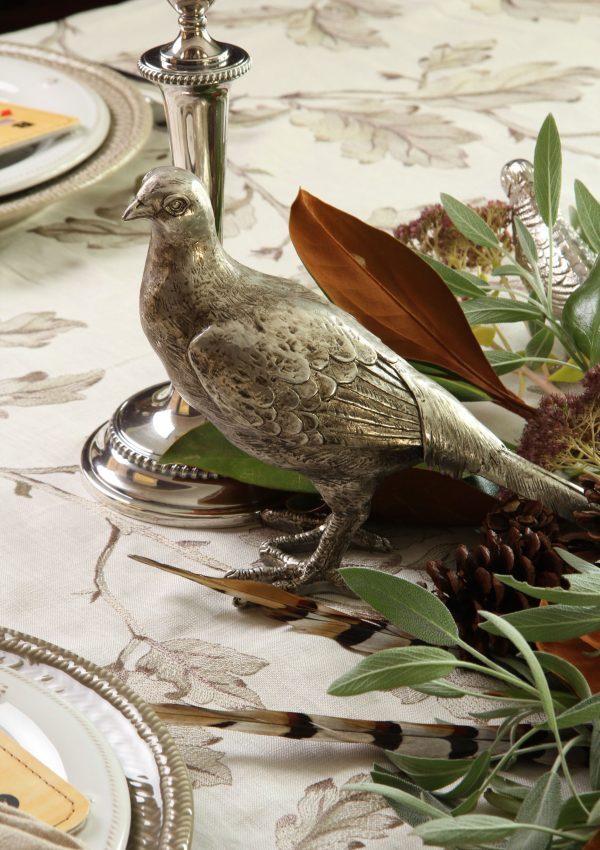 Setting the Table for Thanksgiving with Fresh Greenery and Silver Birds