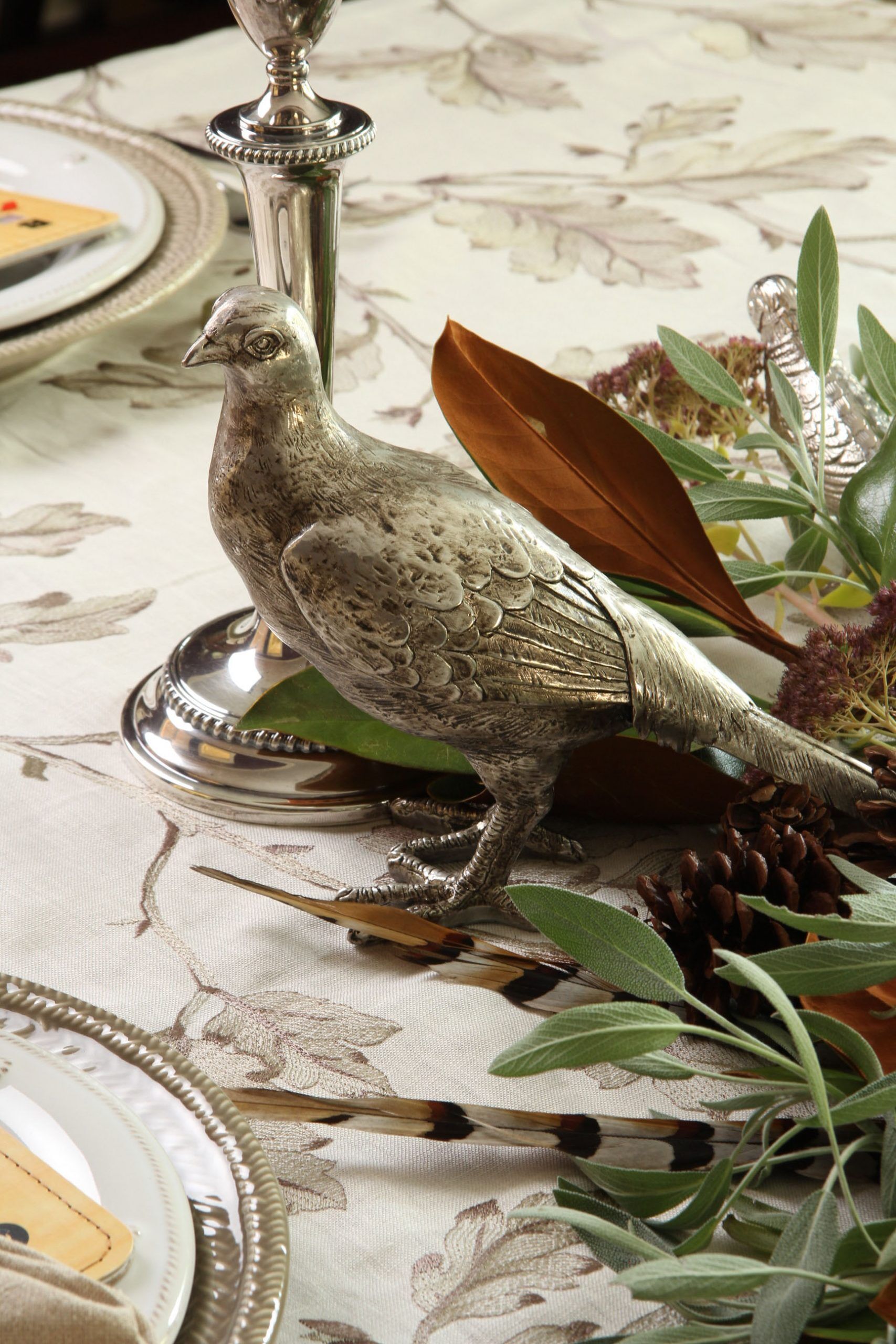 Need a little inspiration for your Thanksgiving table? Why not add some pretty greenery and some silver birds? A fresh and easy update.