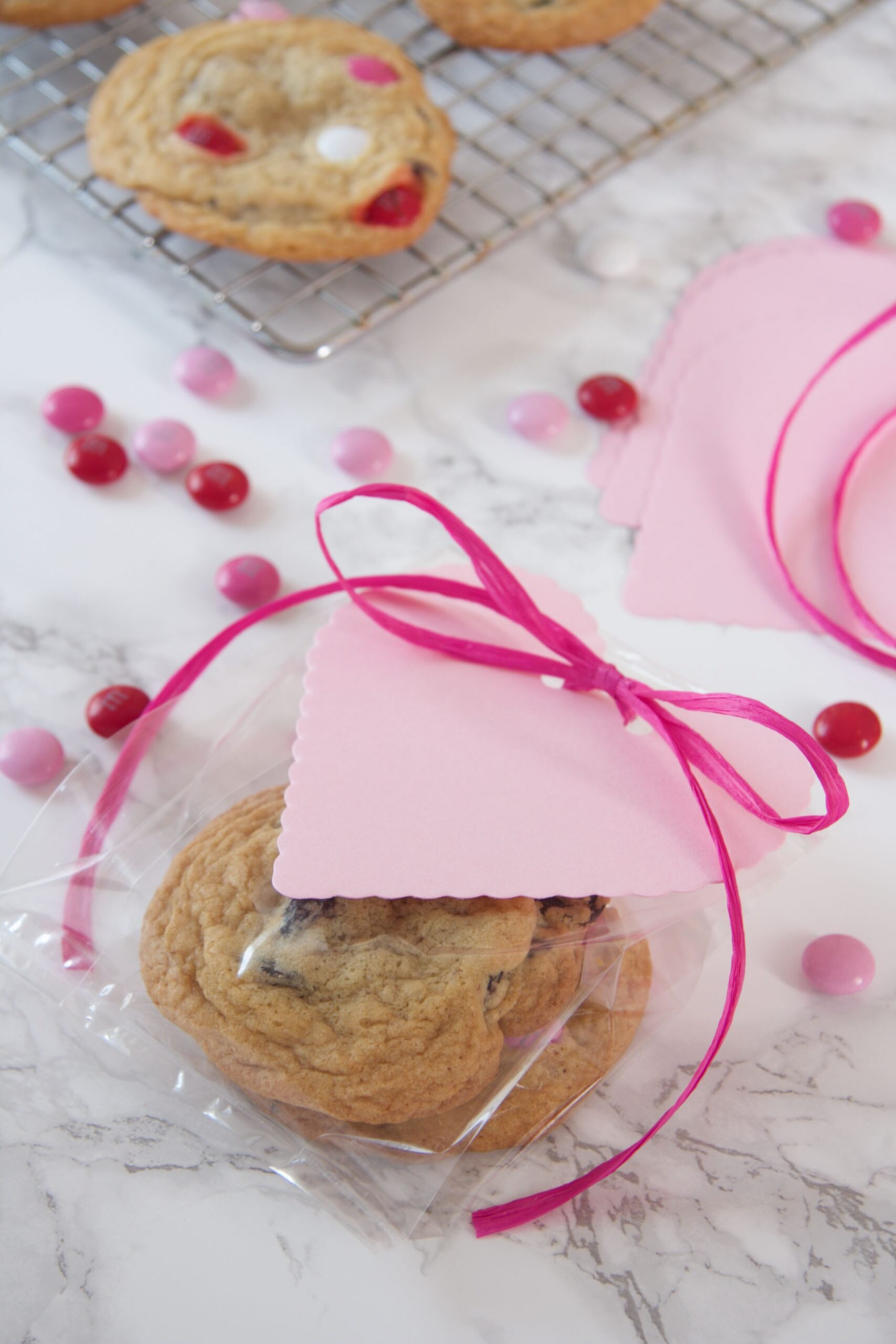 Bake these Chocolate Chunk Chewy Cookies with M&M'S® or Dried Cherries for Valentine's Day| Ridgely's Radar Make these swoon worthy Chocolate Chunk Cookies with Valentine colored M&M'S® and dried cherries for a Valentine's Treat! One is not enough!