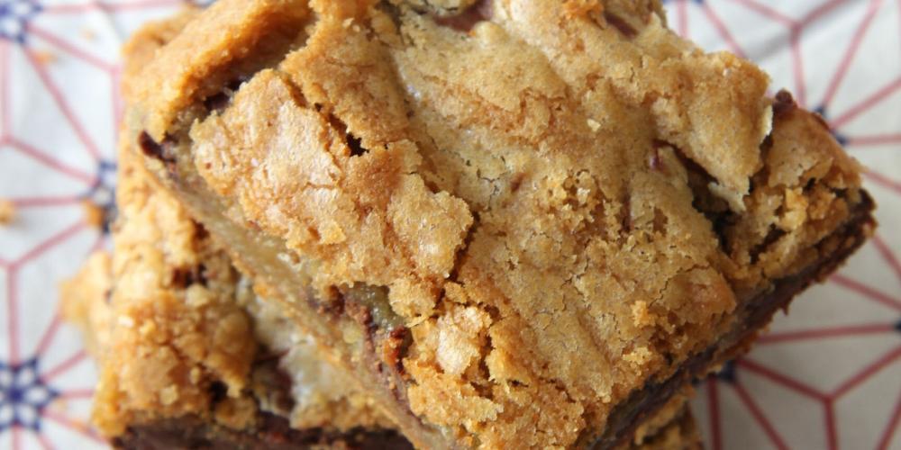 Don't have time to rotate baking sheets of cookies? Make these AMAZING Chocolate Chunk Blondies. One pan baked in 30 minutes.