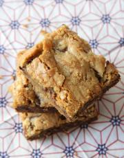 Don't have time to sit in your kitchen rotating baking sheets of cookies? Make these AMAZING Chocolate Chunk Blondies. One pan baked in 30 minutes.