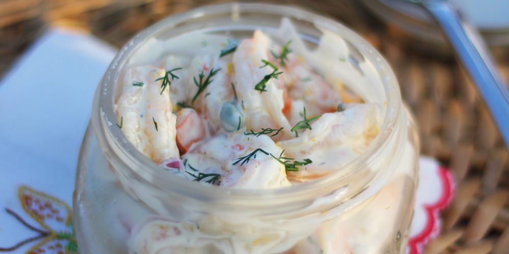 Ina Garten's Roasted Shrimp Salad is perfect for a picnic. Place the prepared salad in individual wide mouth mason jars for easy transport and eating.