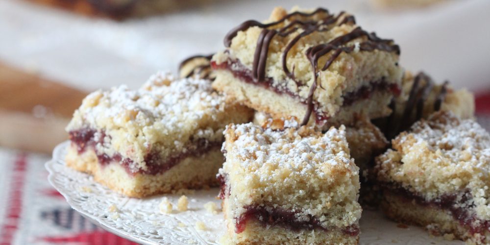 Make these raspberry crumble-topped bars as an afternoon treat or yummy dessert! It's a easy recipe perfect for Valentine's Day!