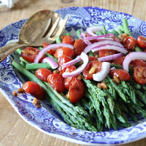 Looking for a healthy, delicious side dish Ridgely Brode makes Asparagus with Balsamic Tomatoes and Pine Nuts on her blog Ridgely's Radar.