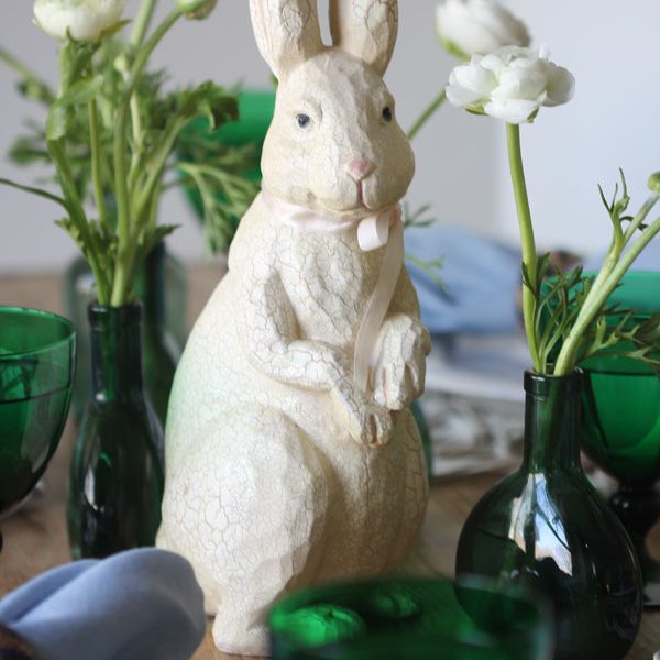 Ridgely Brode creates a simple and rustic green and white table for Easter on her blog, Ridgely's Radar.