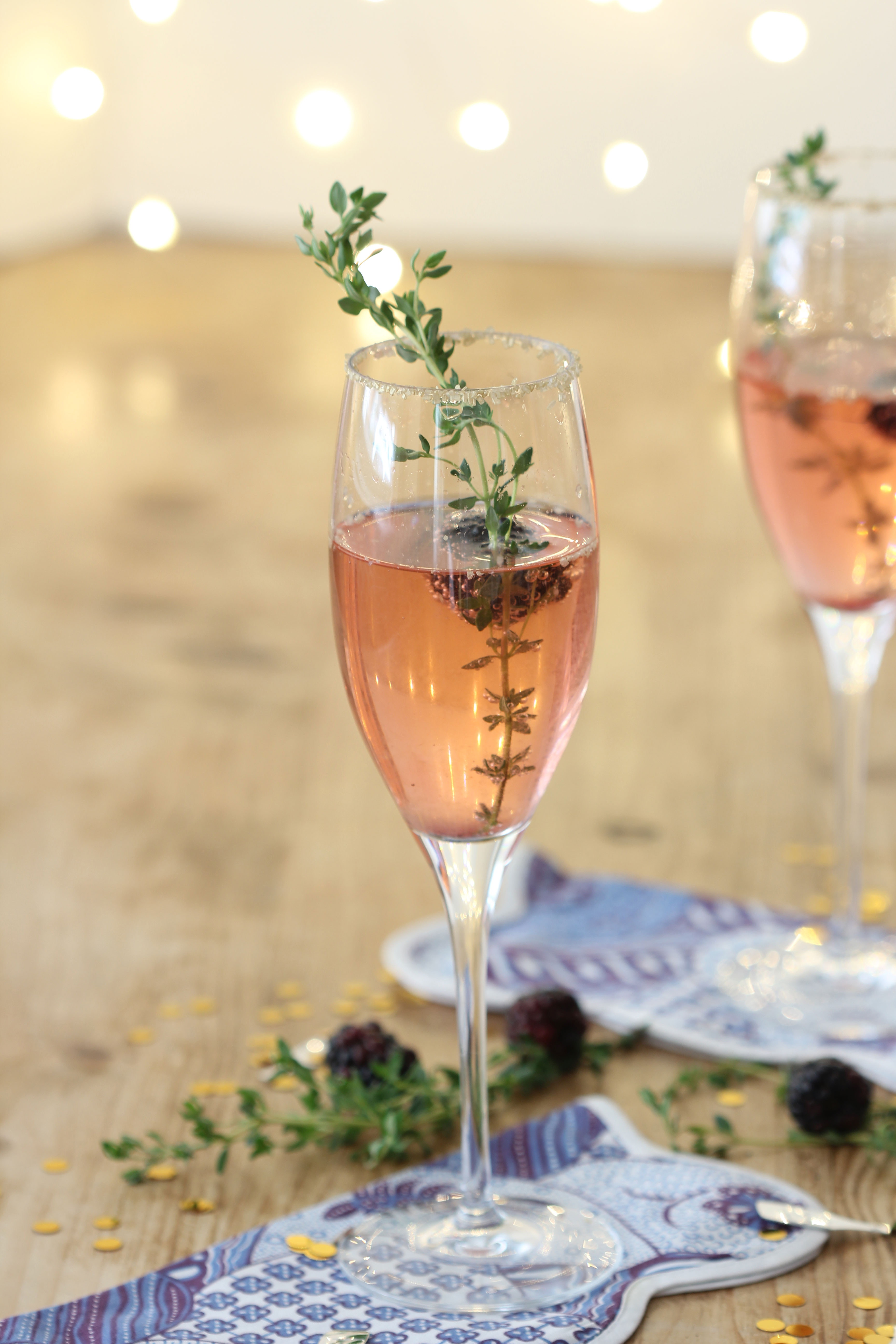 Looking for a fun, festive and delicious Cocktail for the Holidays? This Blackberry Thyme Champagne Cocktail is always a hit!