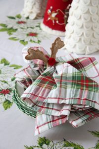 Mixing and matching your plaid, tartan and holiday linens at Christmas is a fun and festive way to decorate your table.