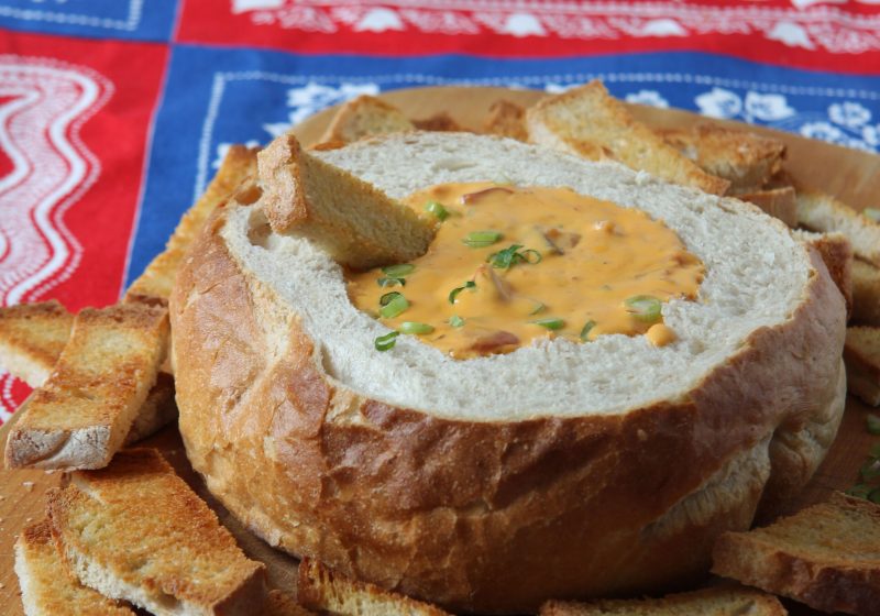 Make this gooey, cheesy nacho dip that features RAGU Double Cheddar Cheese Sauce. Put it in a scooped out bread bowl and dip with toasted bread fingers!