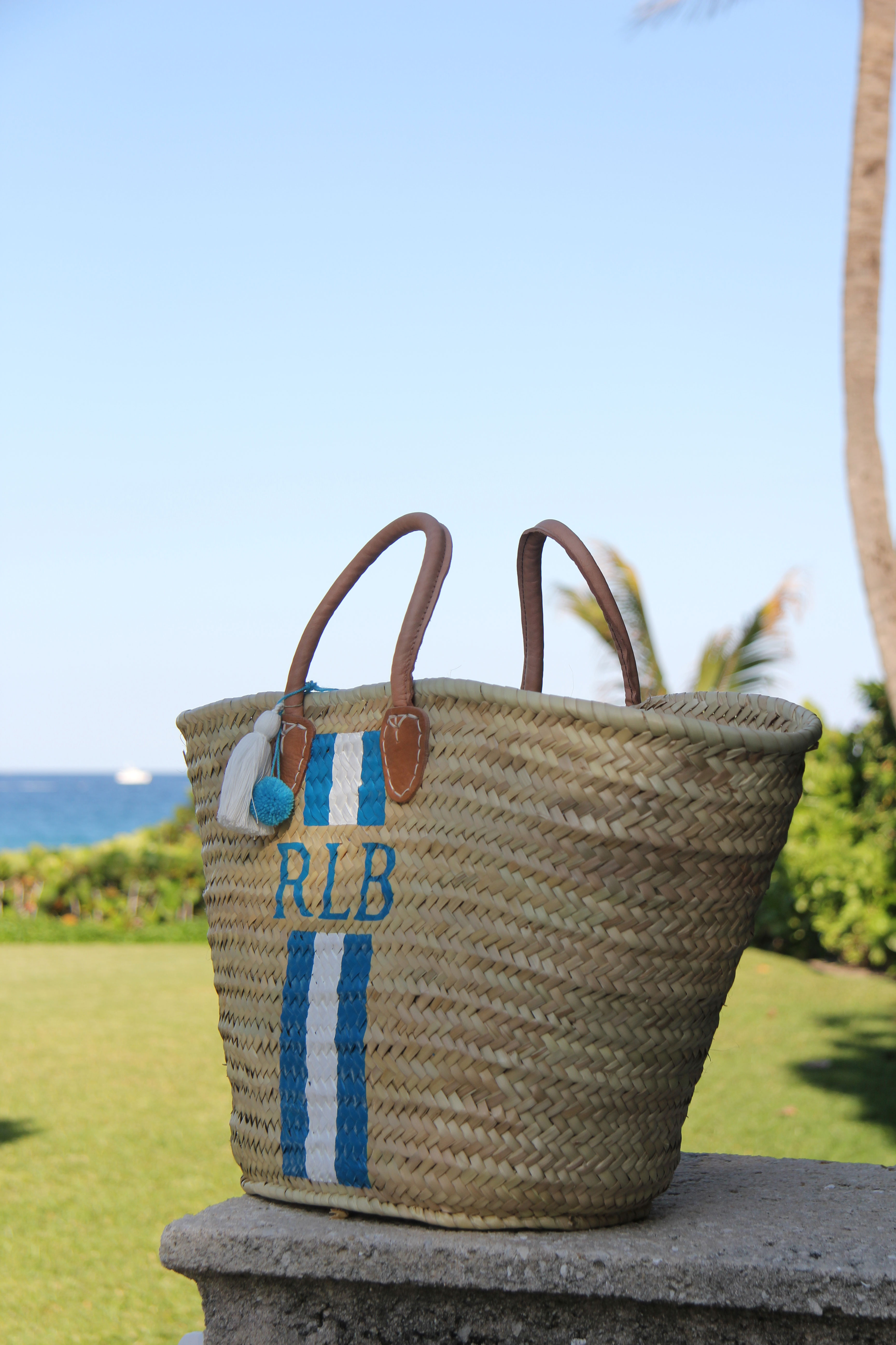 Ridgely Brode loves her monogramed straw tote from Lively Design and wants you to get to know Kelly the designer behind the fabulous personalized bags.