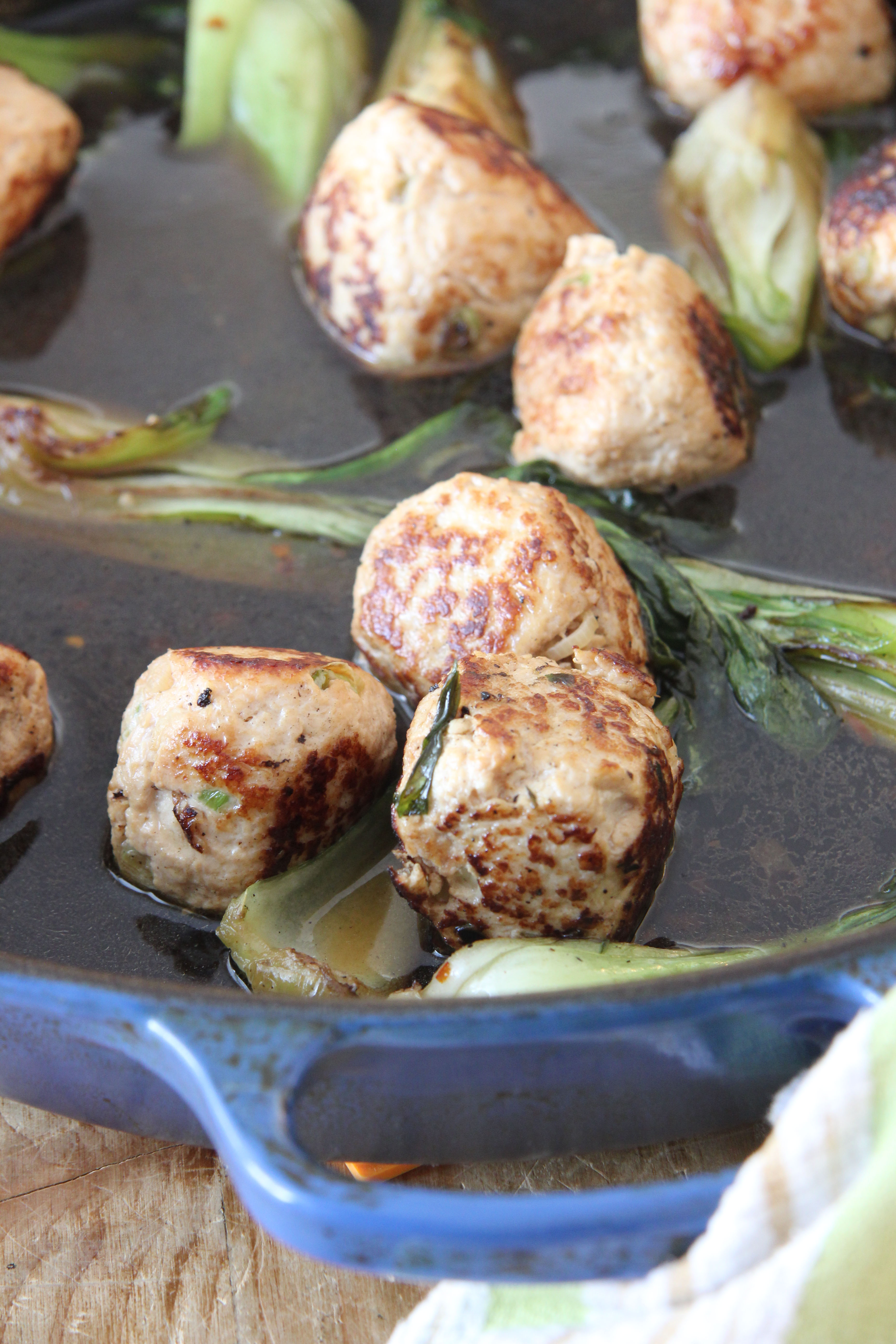 Looking for a delicious, easy dinner? Try this quick ginger-chicken meatball recipe! We served them over Thai rice noodles and it was a hit!