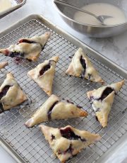 Make these glazed blueberry blackberry turnovers for an afternoon treat or special dessert. You can use my pie crust shortcut or make your own! Yum!