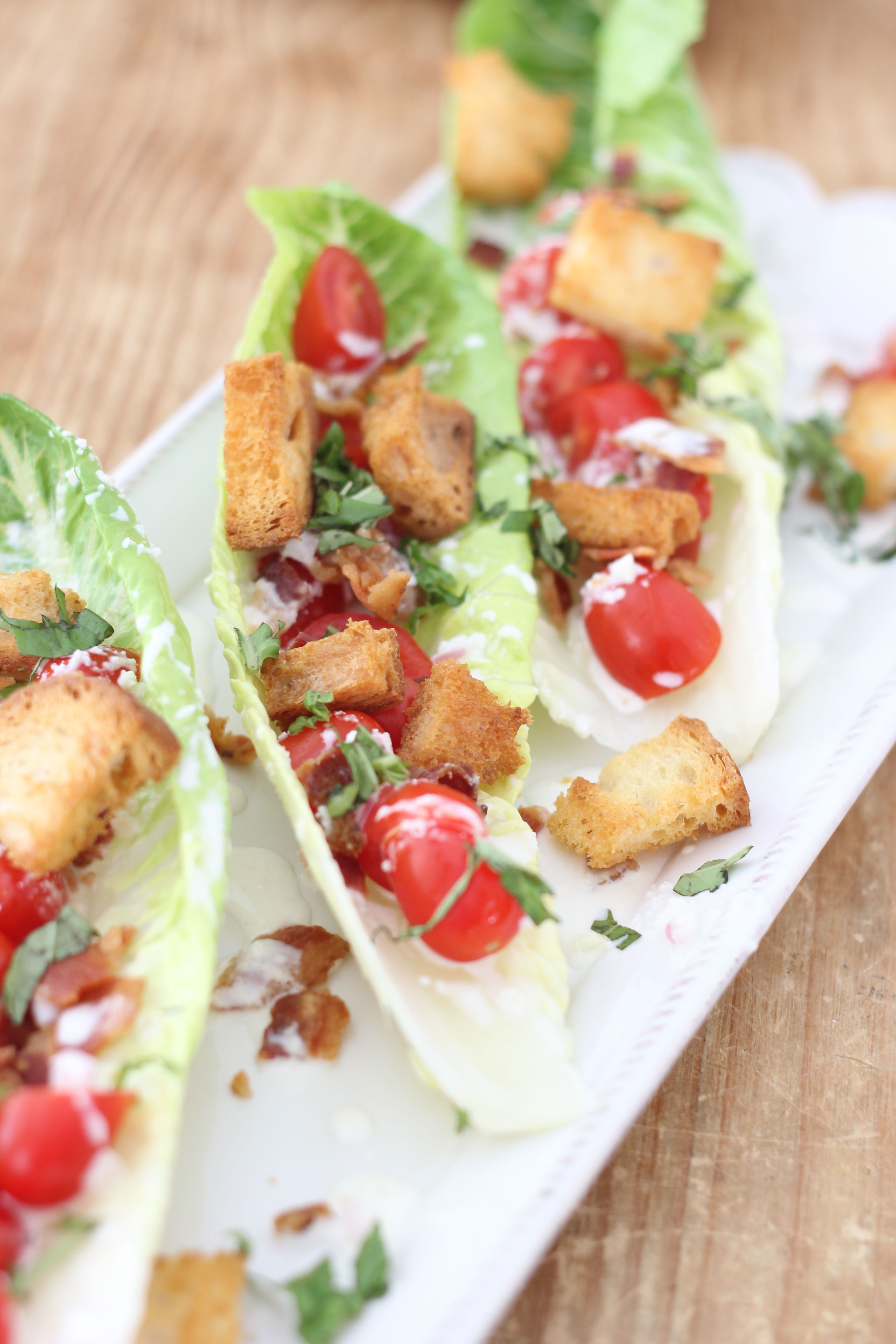 Love a BLT Sandwich? This BLT Salad with Buttermilk-Parmesan Dressing and Buttery Croutons is the next best thing.. maybe even better! YUM!