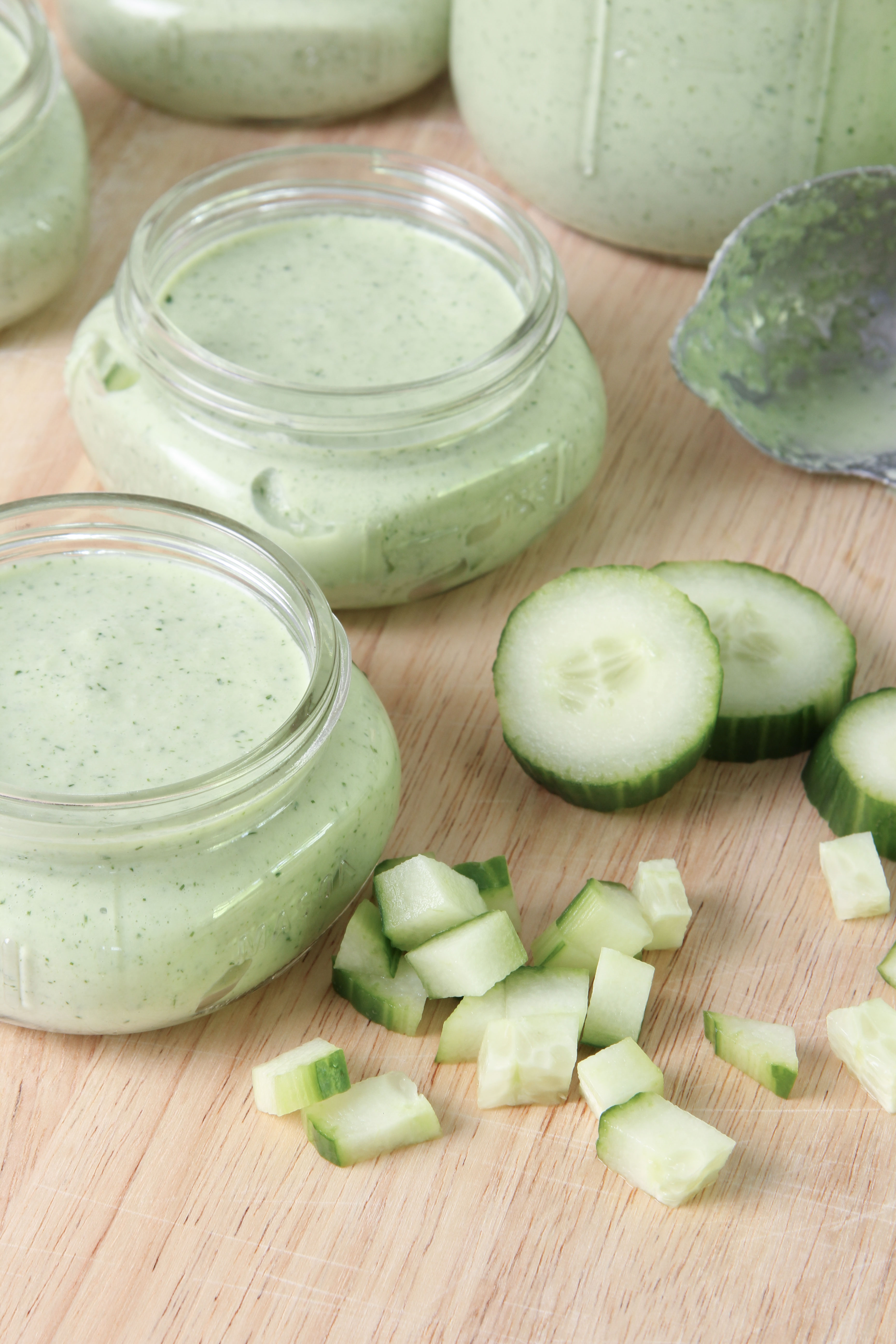 Chilled Cucumber Dill and Yogurt Soup in wide mouth mason jars for a picnic