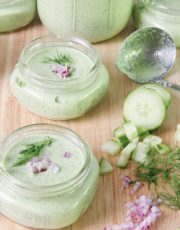Garnished Chilled Cucumber Dill and Yogurt Soup in Wide mouth Mason Jars for a Picnic