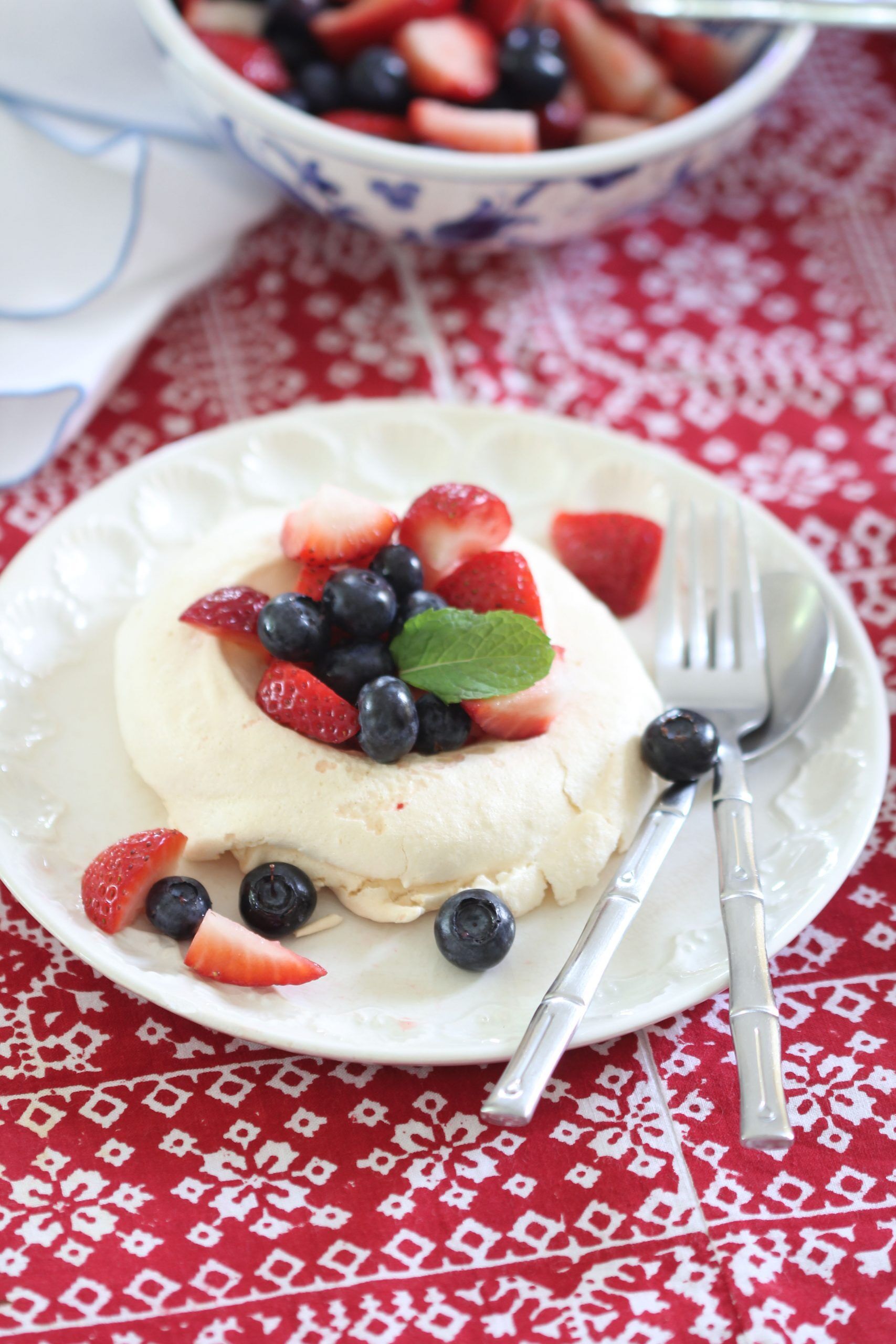 Looking for an easy and delicious dessert? Make these Meringue Nests with Mixed Berries. Buy the meringues already made or you can bake them!