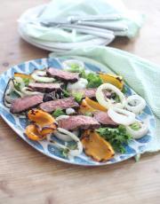 There is nothing better than a really good steak cooked on the grill! Add in some onions and peppers and make this yummy salad!