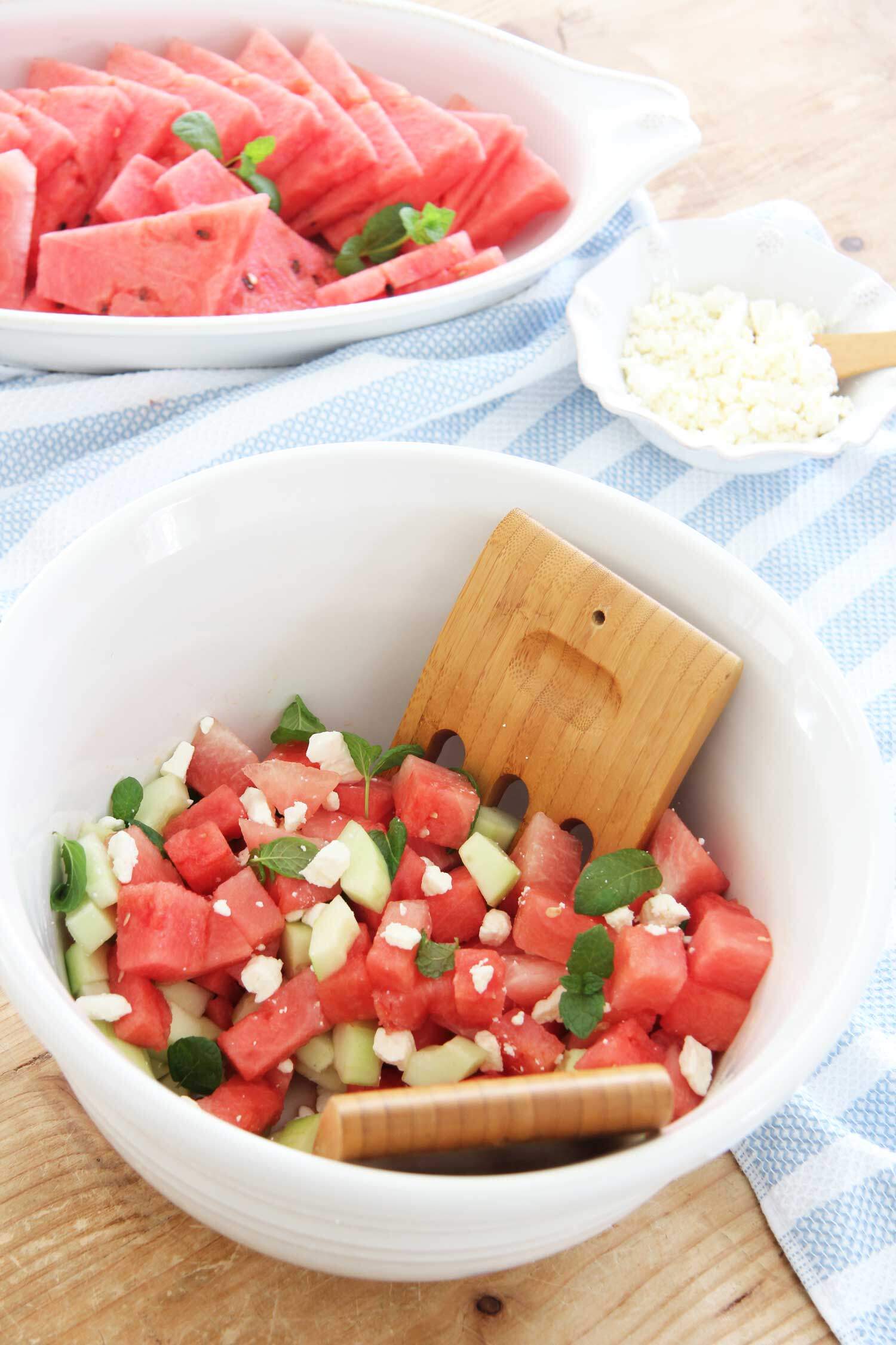 This watermelon salad with feta and cucumber is perfect for a HOT Summer day or night. Crispy, refreshing, sweet with a salty bite mixed in.