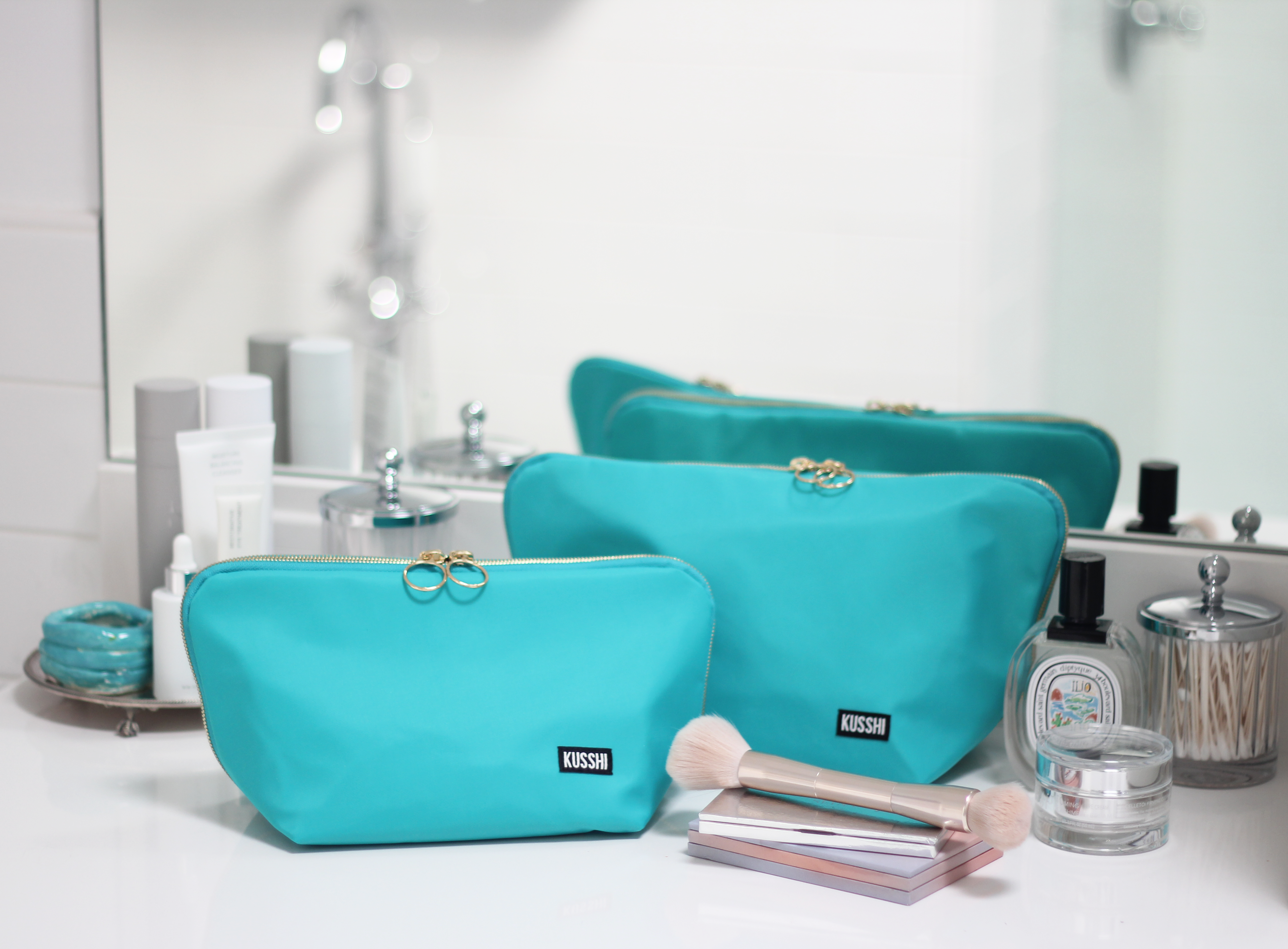 Small Makeup Bag with Multiple Compartments by Kusshi