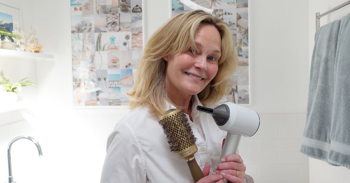 How to Style Curly Frizzy Hair Smooth and Sleek with the Dyson Hairdryer and Round Brush.